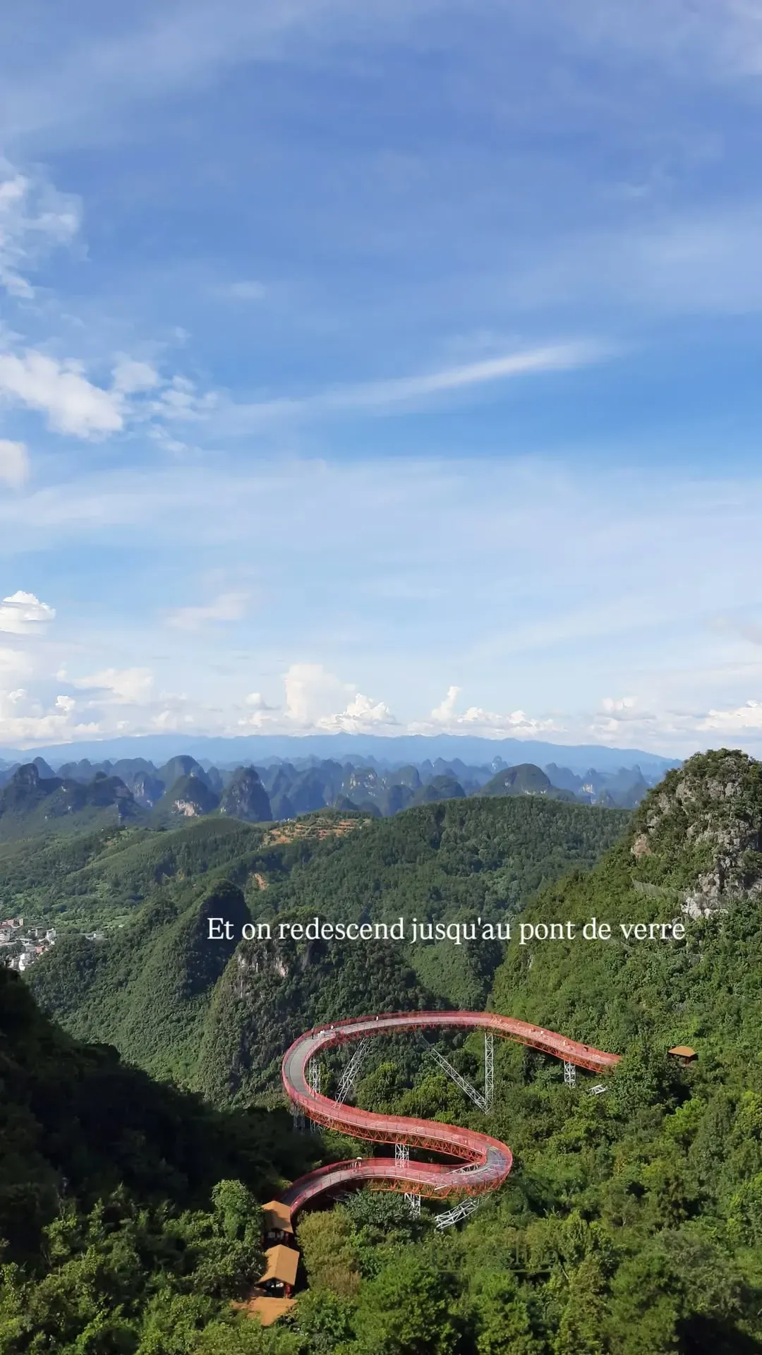 Aerial view of the winding glass-bottom walkway descending from Ruyi Peak, Yangshuo, China