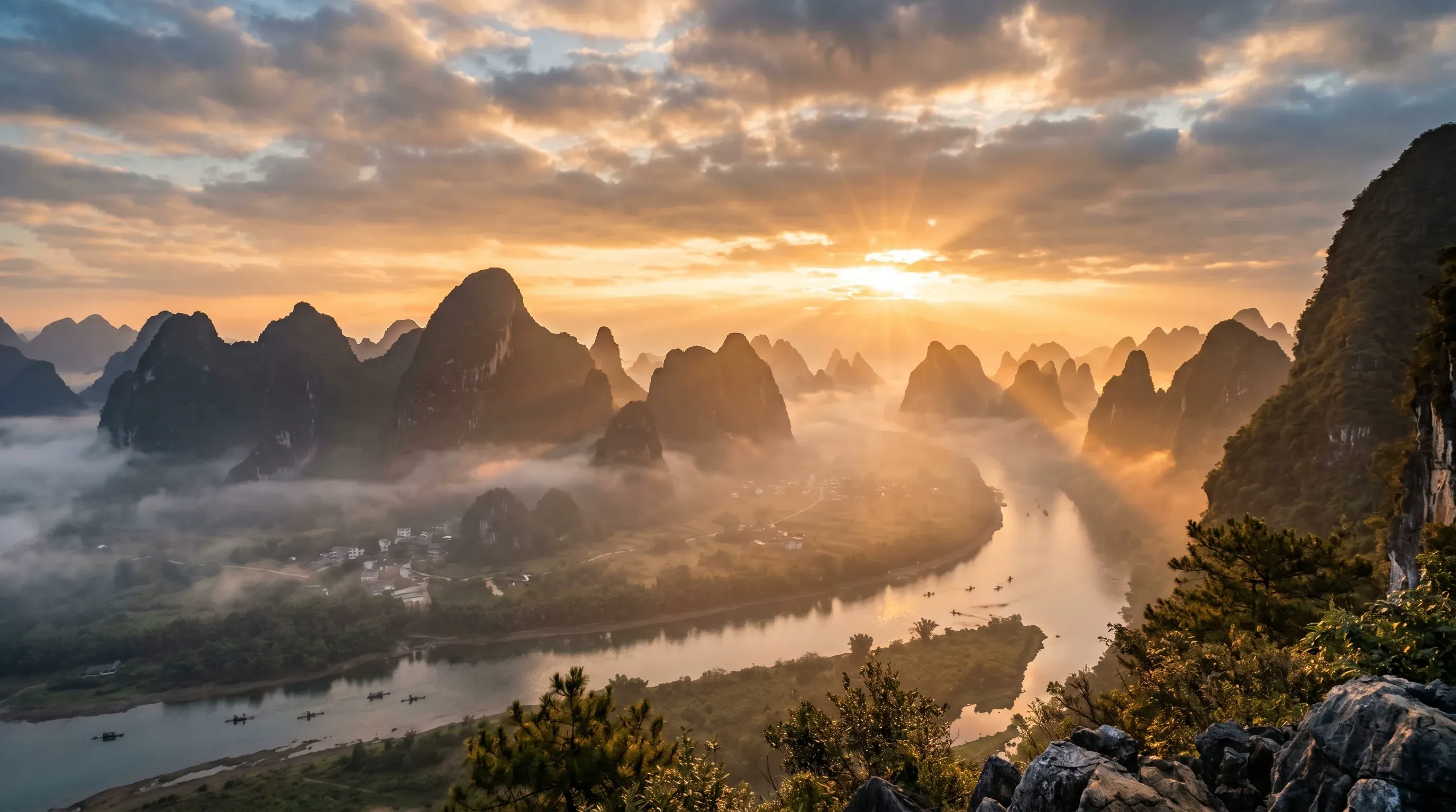 Misty karst limestone mountains at dawn near Yangshuo, Guangxi, China - spiritual travel atmosphere