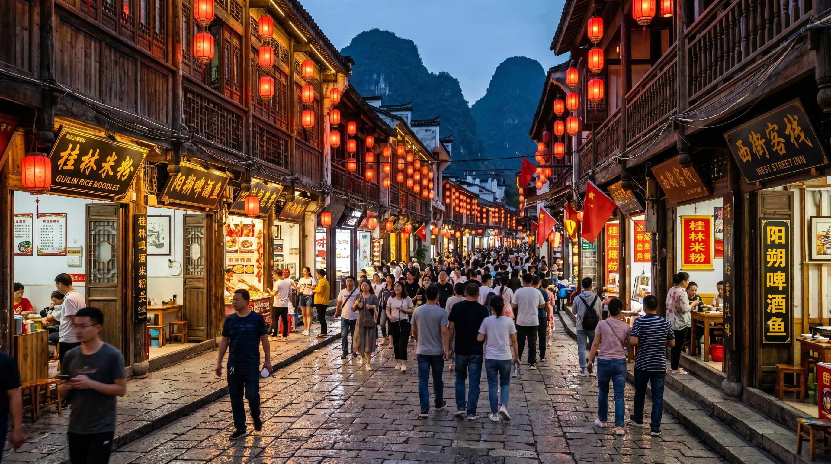 Historic West Street in Yangshuo, Guangxi, China at evening - ancient cobblestone street with traditional architecture